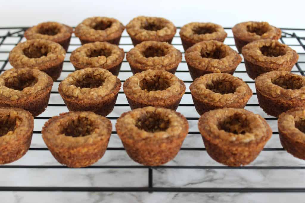 Cookie cups with an empty well in the middle.