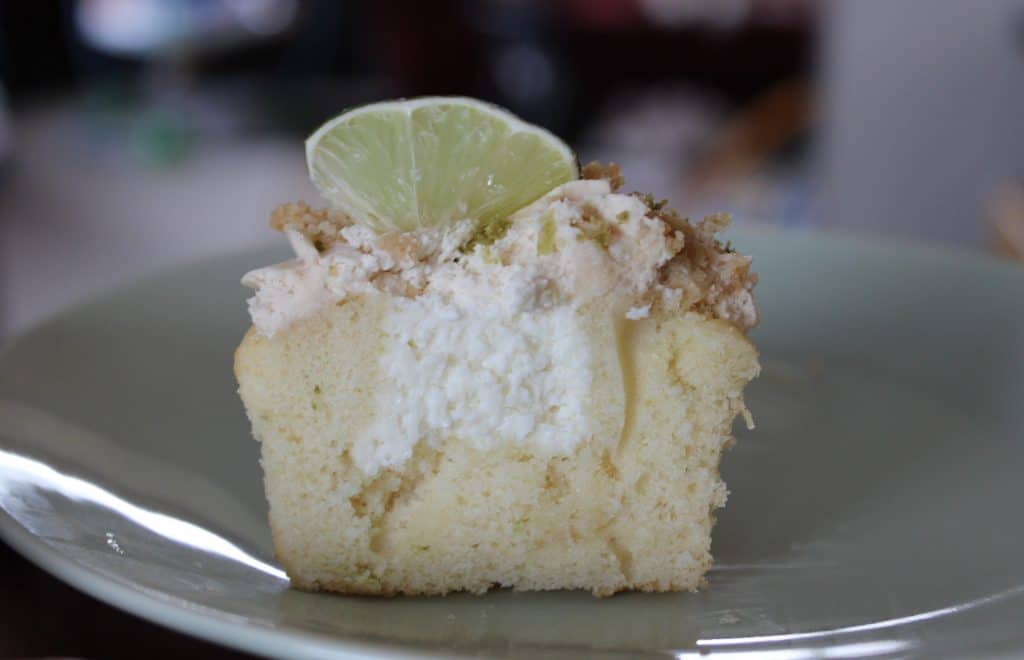 a single cupcake sliced in half to see the filling