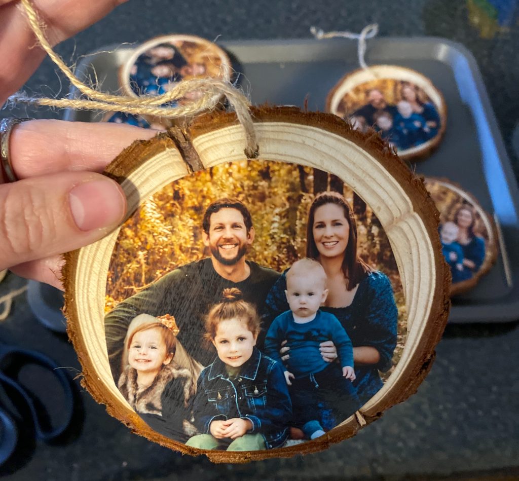 family picture on a wooden circle ornament